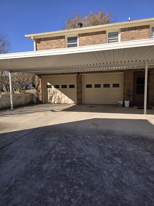 exterior space with a carport