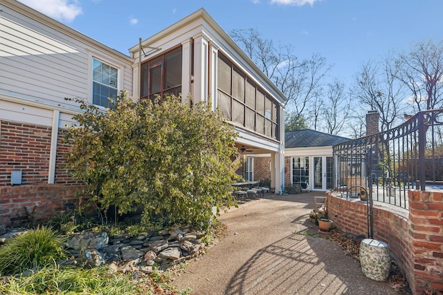 back of property with a patio