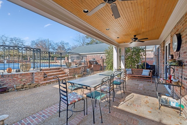 view of patio with ceiling fan