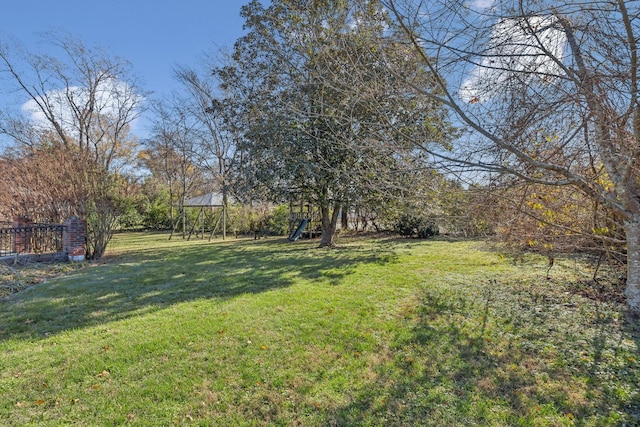 view of yard featuring a playground