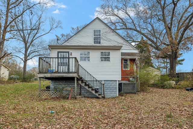 back of house featuring central air condition unit