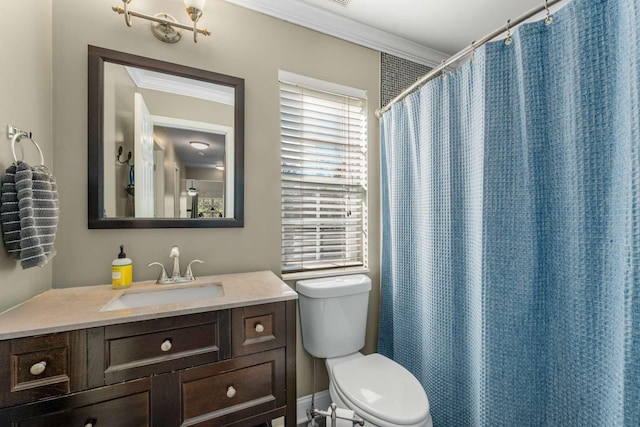 bathroom with a shower with curtain, crown molding, vanity, and toilet