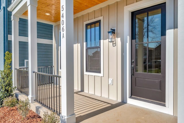 property entrance featuring covered porch