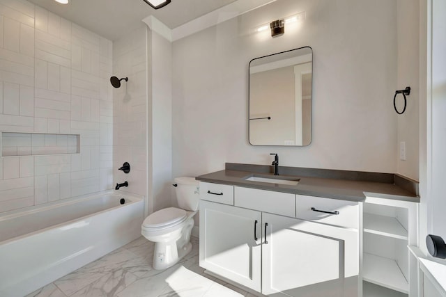 full bathroom featuring tiled shower / bath combo, vanity, and toilet