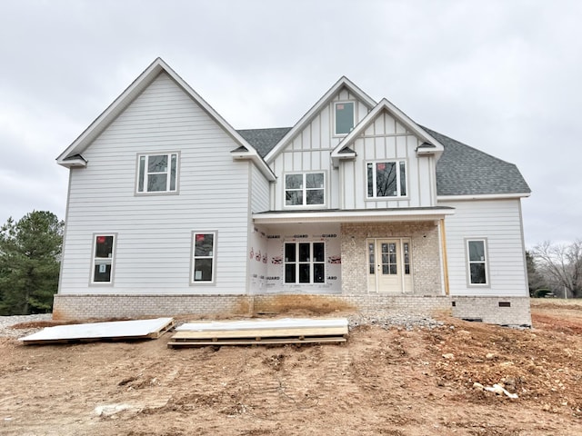 back of house with a porch