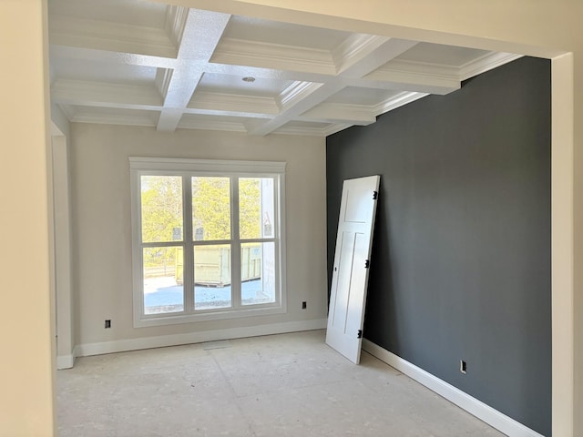 unfurnished room with crown molding, baseboards, coffered ceiling, and beamed ceiling