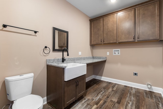 laundry room with sink, washer hookup, dark hardwood / wood-style floors, and hookup for an electric dryer