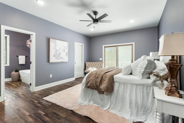 bedroom with connected bathroom, dark hardwood / wood-style floors, and ceiling fan