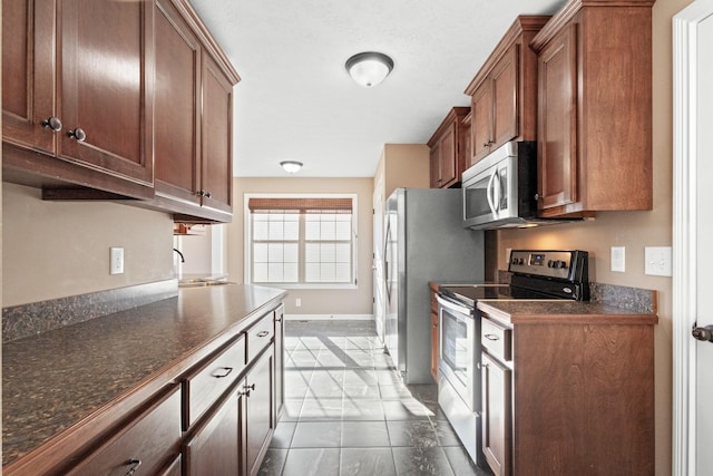 kitchen with sink and appliances with stainless steel finishes