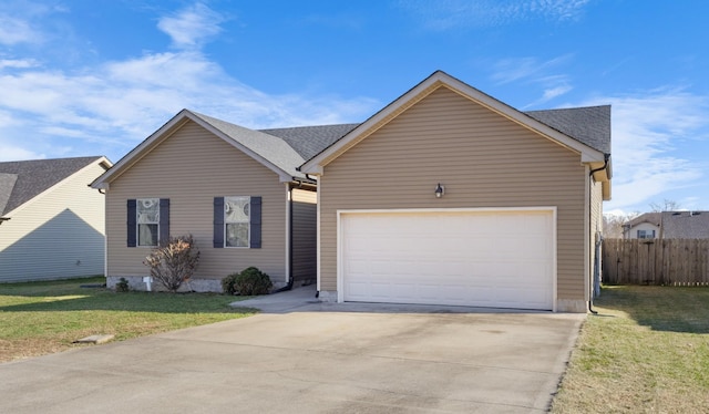 single story home with a garage and a front lawn