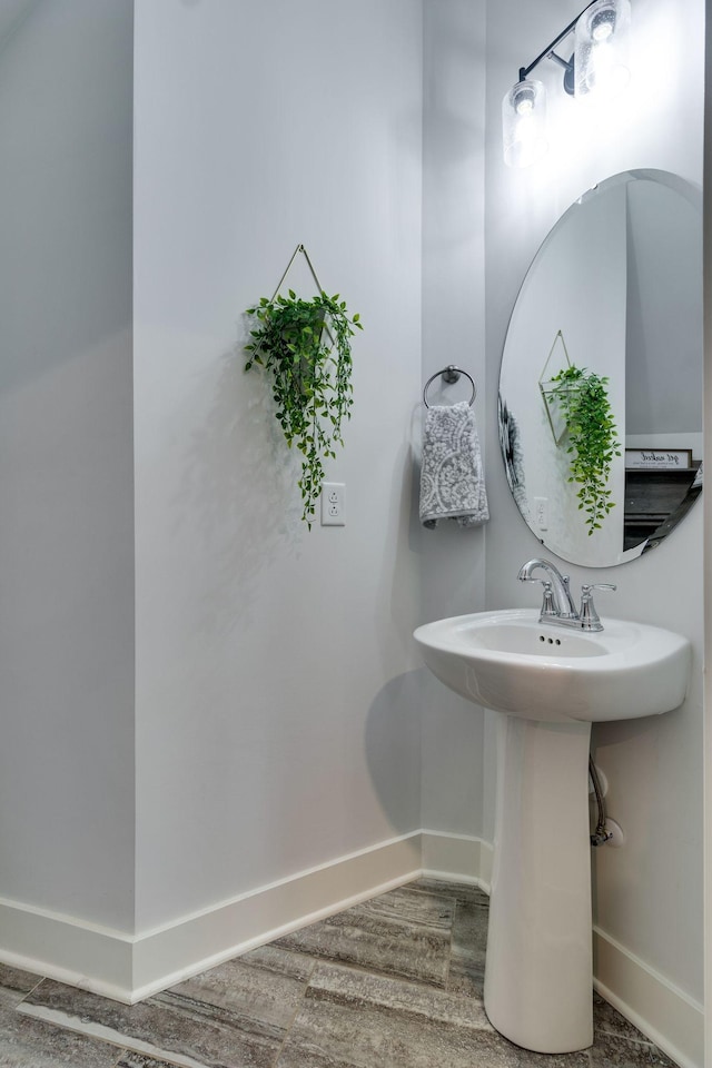 bathroom featuring hardwood / wood-style floors and sink