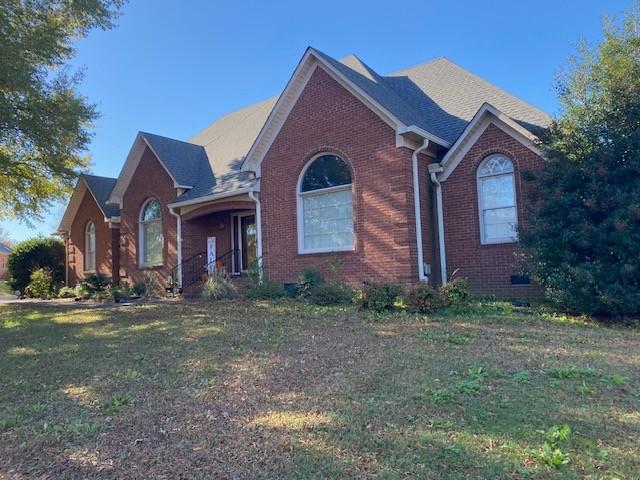 view of front property with a front lawn