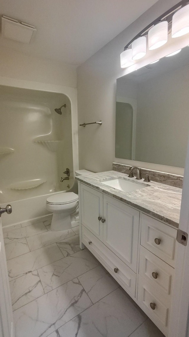 full bathroom with vanity, toilet, and shower / tub combination