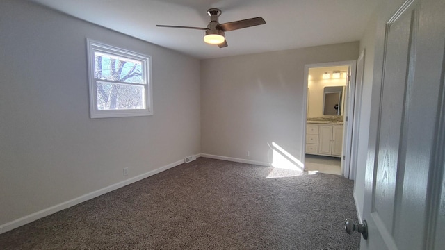 carpeted empty room with ceiling fan