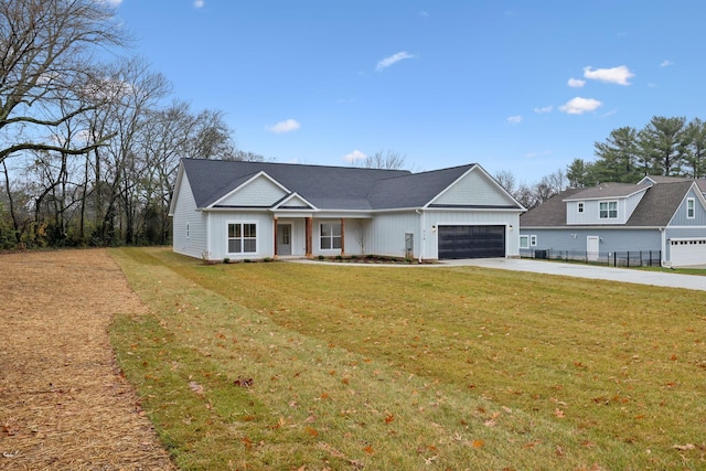 ranch-style house with a garage and a front yard