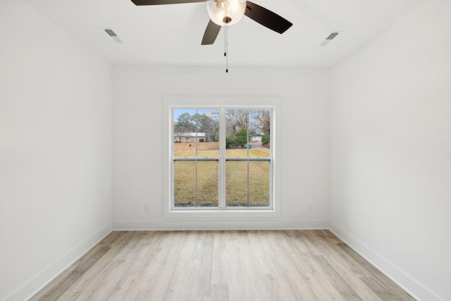 unfurnished room with ceiling fan and light hardwood / wood-style floors