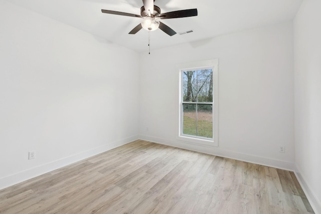 unfurnished room with ceiling fan and light wood-type flooring