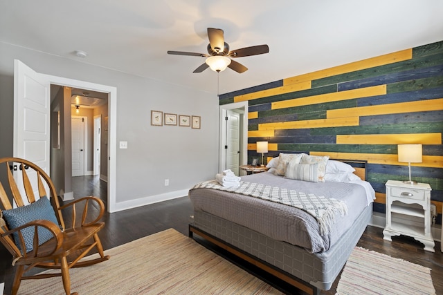 bedroom with ceiling fan and wood-type flooring