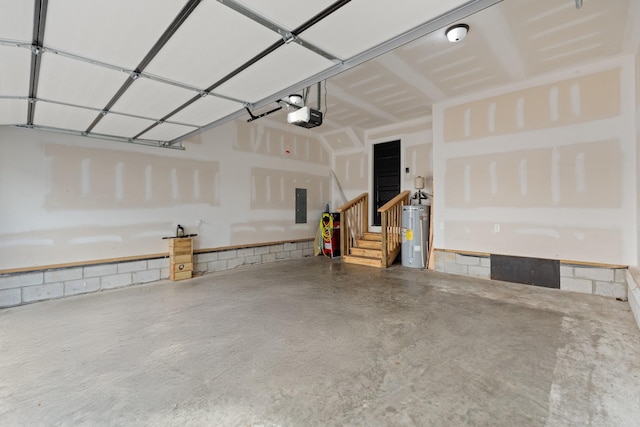 garage with electric panel, water heater, and a garage door opener