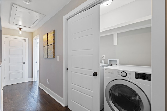 laundry room featuring washer / dryer and dark wood-type flooring