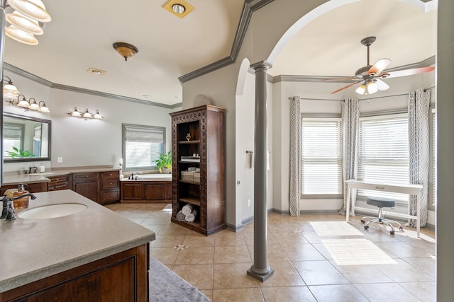 bathroom featuring ornate columns, ceiling fan, tile patterned floors, vanity, and ornamental molding