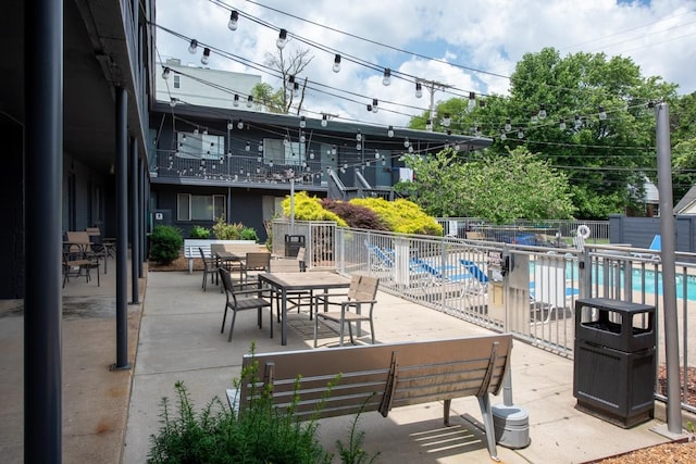 view of patio with a community pool