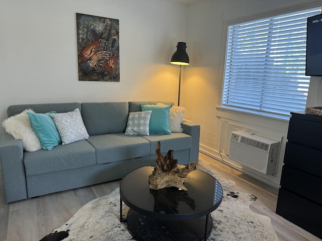 living room with light hardwood / wood-style flooring