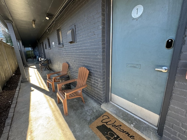 property entrance with covered porch