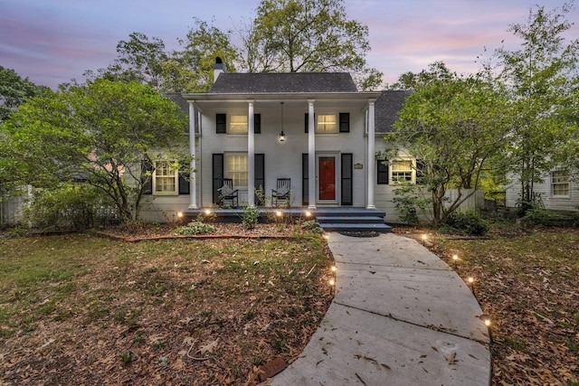 view of front of house with covered porch