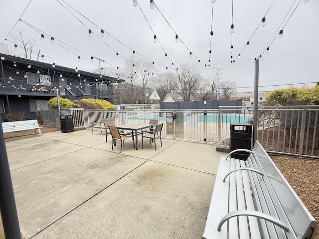 view of patio / terrace featuring a community pool