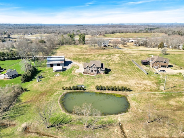 bird's eye view featuring a rural view and a water view