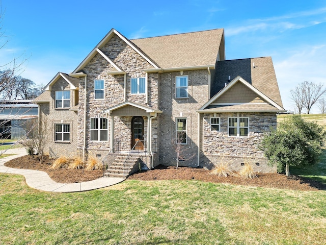 craftsman-style home with a front lawn