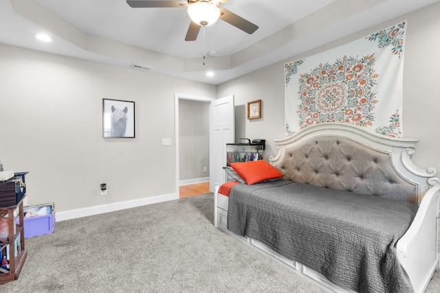 bedroom with ceiling fan and carpet