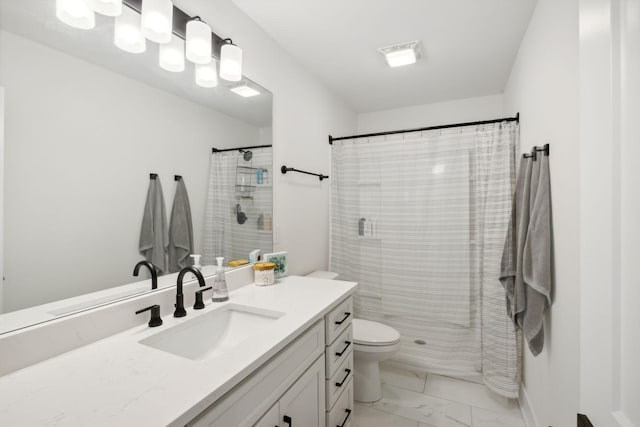 bathroom featuring a shower with curtain, vanity, and toilet