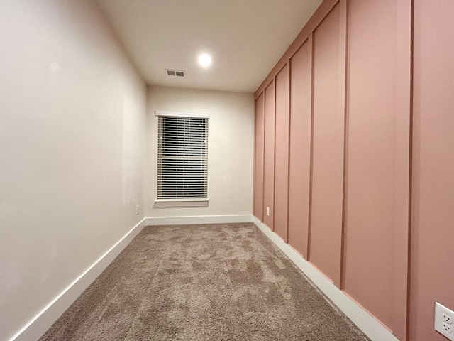 spare room with carpet