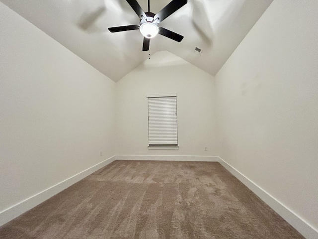 unfurnished room with light carpet, ceiling fan, and lofted ceiling