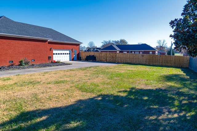 view of yard featuring a garage