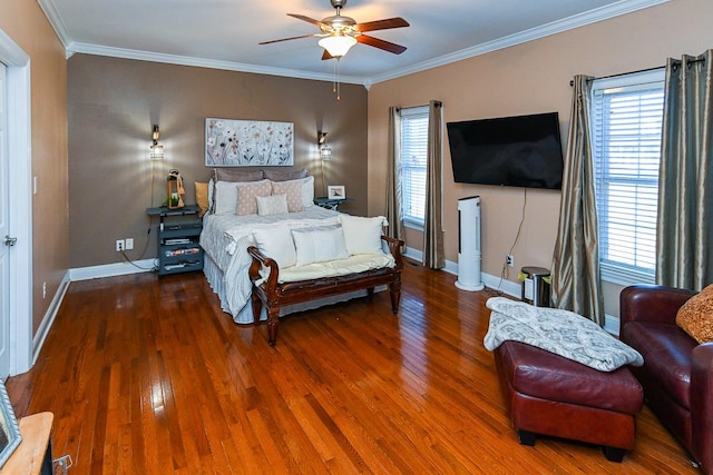 bedroom featuring crown molding, ceiling fan, and dark hardwood / wood-style flooring