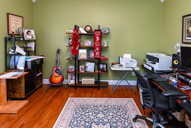 home office featuring dark wood-type flooring