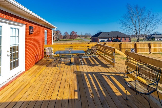 wooden deck with french doors