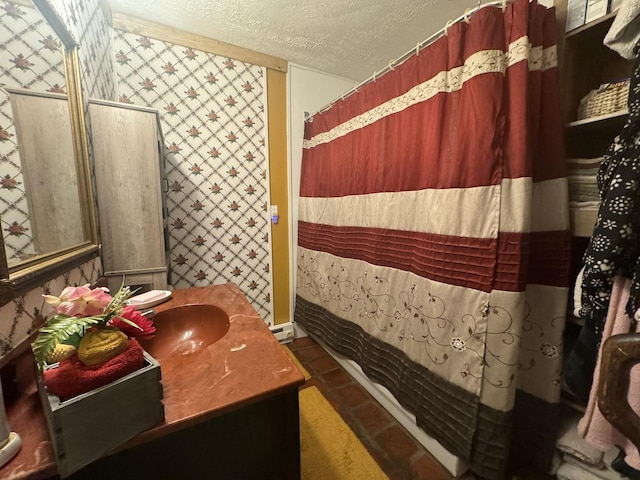 10795 Back Piney Rd, Bon Aqua, TN 37025 - bathroom with wallpapered walls, a textured ceiling, vanity, curtained shower, and a baseboard radiator