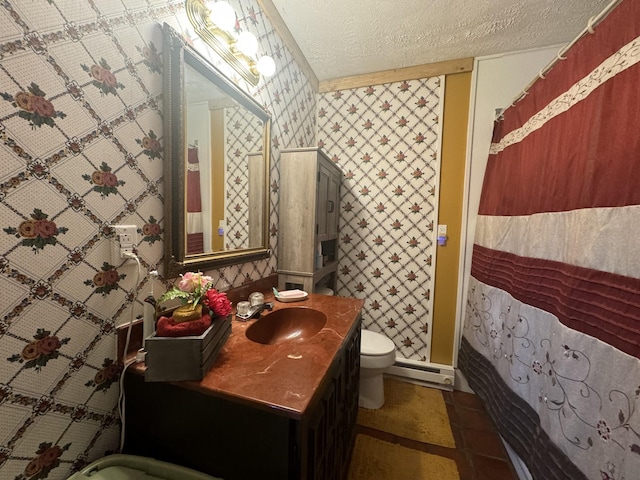 bathroom with a shower with curtain, vanity, a textured ceiling, baseboard heating, and toilet