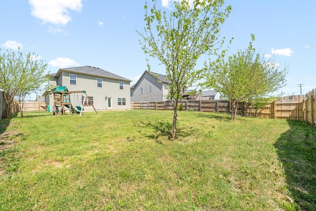 view of yard featuring a playground