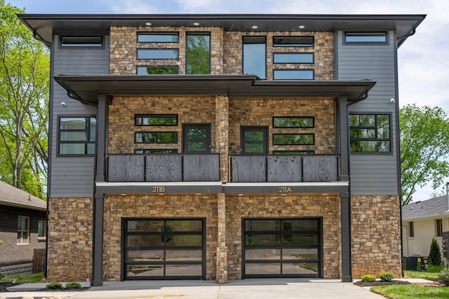 view of front of house featuring a balcony