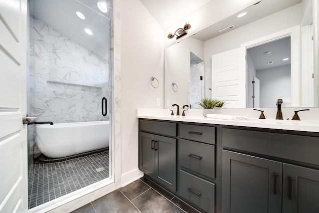 bathroom with tile patterned flooring, vanity, and shower with separate bathtub