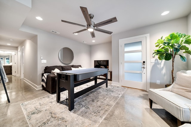 interior space featuring ceiling fan