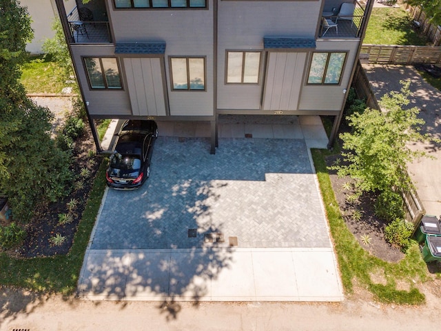 exterior space with a carport