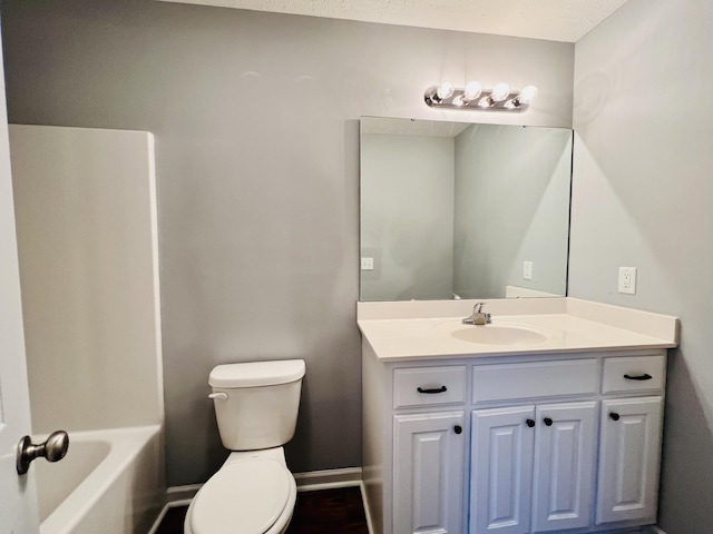 full bathroom featuring vanity,  shower combination, and toilet