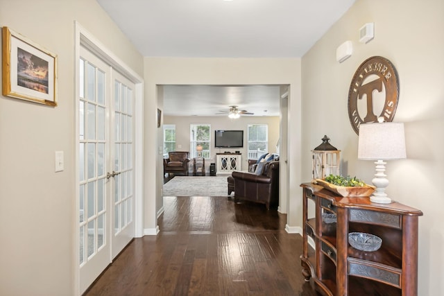 hallway featuring french doors and dark wood-type flooring