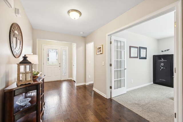 entryway with dark wood-type flooring